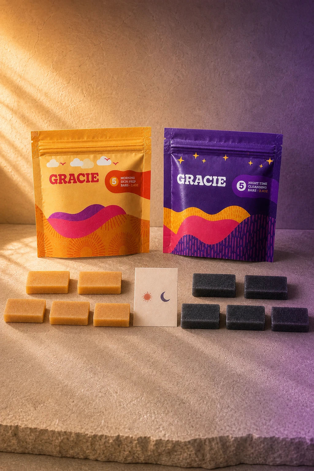 The complete Gracie starter kit with exactly five gold Morning bars, five charcoal Evening bars, two resealable pouches, and one routine card